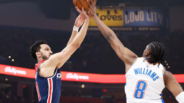 Feb 23, 2024; Oklahoma City, Oklahoma, USA; Oklahoma City Thunder forward Jalen Williams (8) blocks a shot by Washington Wizards guard Landry Shamet (20) during the first quarter at Paycom Center. Mandatory Credit: Alonzo Adams-USA TODAY Sports